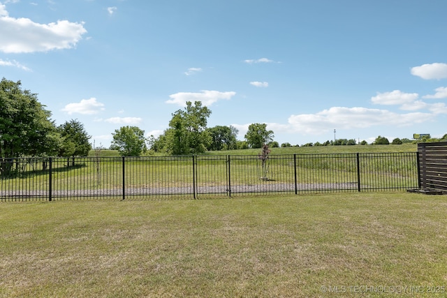 view of yard with a view of rural / pastoral area