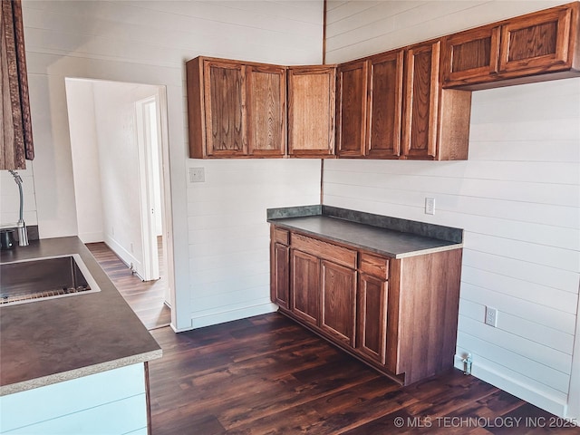 216 Belt Ave, Eufaula, OK 74432 - kitchen featuring dark countertops and dark wood-style flooring
