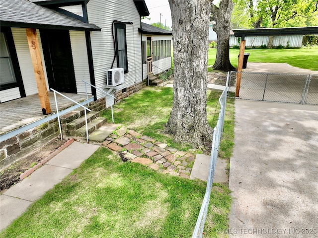 216 Belt Ave, Eufaula, OK 74432 - view of green lawn with a cooling unit and entry steps