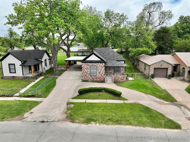 216 Belt Ave, Eufaula, OK 74432 - view of front of home with concrete driveway, stone siding, covered porch, an attached garage, and a carport