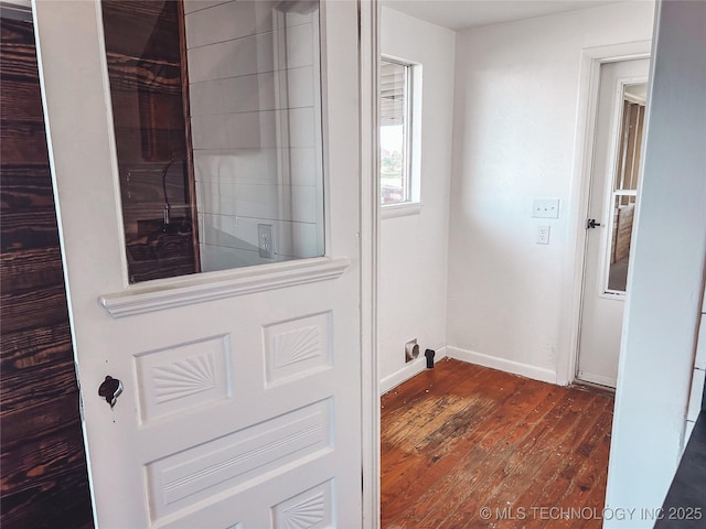 216 Belt Ave, Eufaula, OK 74432 - laundry area with dark wood-style flooring and baseboards
