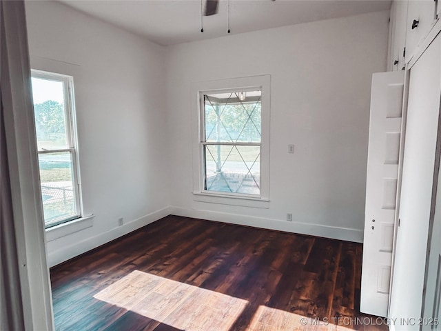216 Belt Ave, Eufaula, OK 74432 - empty room featuring dark wood-style floors, baseboards, and ceiling fan