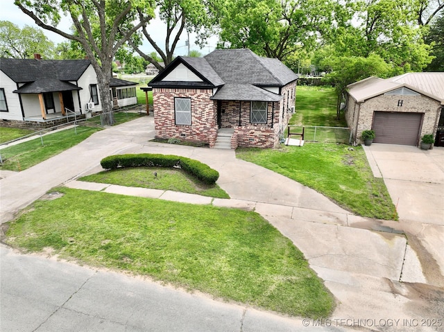 216 Belt Ave, Eufaula, OK 74432 - view of front facade with driveway, brick siding, an attached garage, and a shingled roof