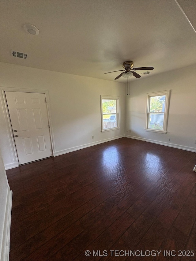 108 N Creek Ave, Bartlesville, OK 74003 - empty room with dark wood-style floors, baseboards, and ceiling fan