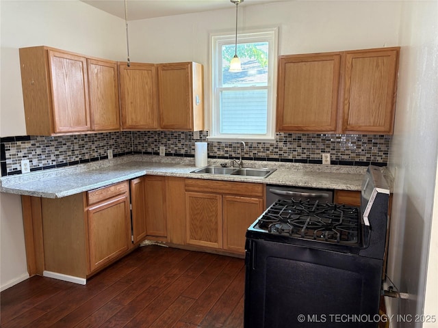 108 N Creek Ave, Bartlesville, OK 74003 - kitchen with a sink, black range with gas cooktop, dark wood-style floors, decorative backsplash, and light countertops
