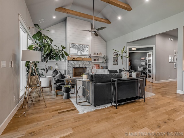 13606 S 21st Pl E, Bixby, OK 74008 - living room featuring a ceiling fan, light wood-type flooring, baseboards, beam ceiling, and high vaulted ceiling