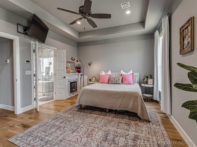 13606 S 21st Pl E, Bixby, OK 74008 - bedroom with light wood-style flooring, multiple windows, baseboards, and recessed lighting
