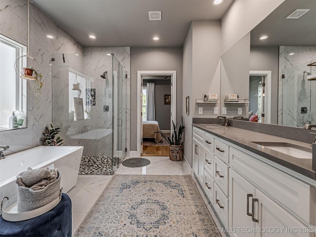 13606 S 21st Pl E, Bixby, OK 74008 - ensuite bathroom with marble tiled flooring, a marble finish shower, recessed lighting, a freestanding tub, and double vanity