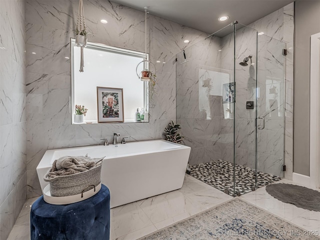13606 S 21st Pl E, Bixby, OK 74008 - bathroom featuring a marble finish shower, a freestanding bath, marble finish floors, recessed lighting, and tile walls