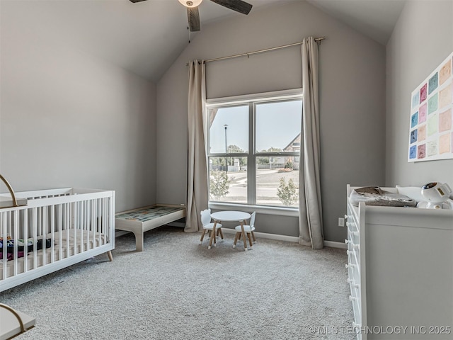 13606 S 21st Pl E, Bixby, OK 74008 - carpeted bedroom featuring vaulted ceiling, a nursery area, ceiling fan, and baseboards