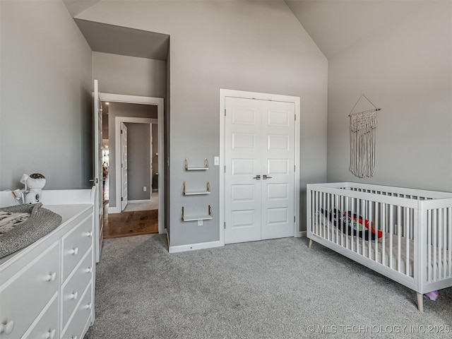 13606 S 21st Pl E, Bixby, OK 74008 - carpeted bedroom with vaulted ceiling and a crib