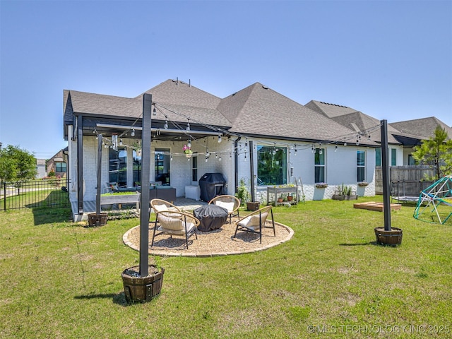13606 S 21st Pl E, Bixby, OK 74008 - back of house with roof with shingles, a patio, and brick siding