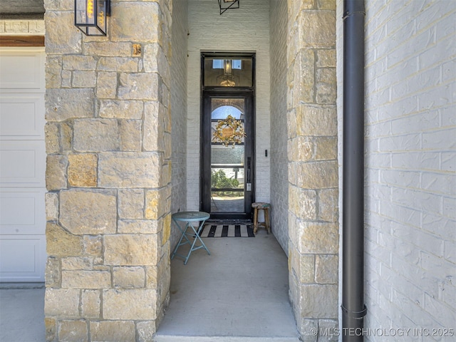 13606 S 21st Pl E, Bixby, OK 74008 - property entrance featuring stone siding and covered porch
