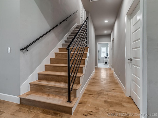 13606 S 21st Pl E, Bixby, OK 74008 - stairway featuring wood finished floors, baseboards, and recessed lighting