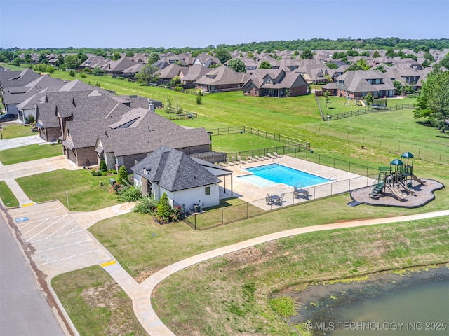 13606 S 21st Pl E, Bixby, OK 74008 - aerial perspective of suburban area with a pool area and a nearby body of water