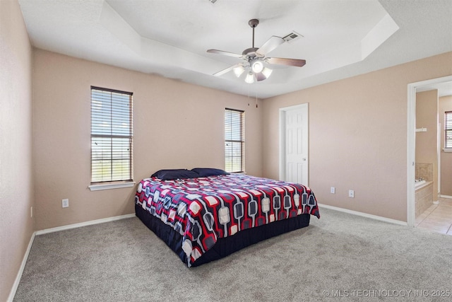 205 Summit, Durant, OK 74701 - bedroom with carpet, baseboards, and a tray ceiling