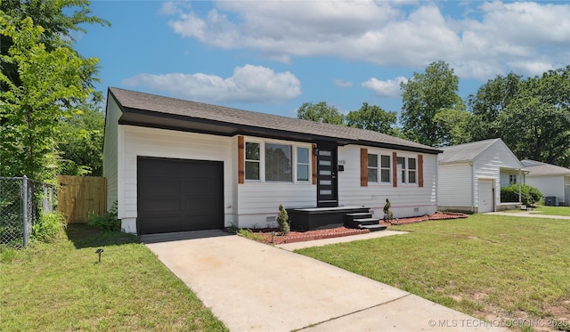 5433 S Boston Ave, Tulsa, OK 74105 - ranch-style house featuring crawl space, a garage, and driveway