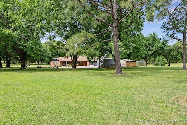 2961 N 24th St W, Muskogee, OK 74401 - view of green lawn featuring view of scattered trees