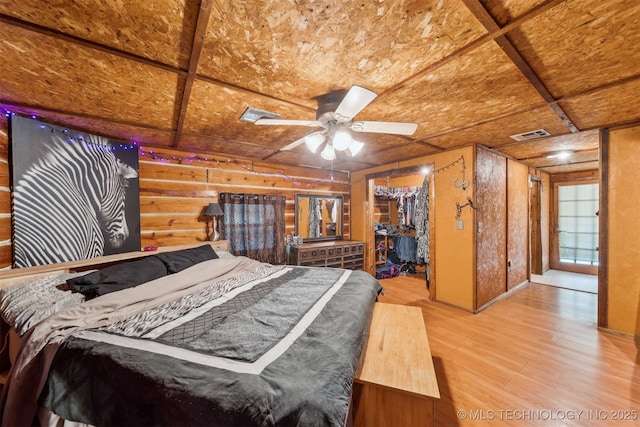 21170 S 270th Rd, Morris, OK 74445 - bedroom with a walk in closet, wood finished floors, and a closet