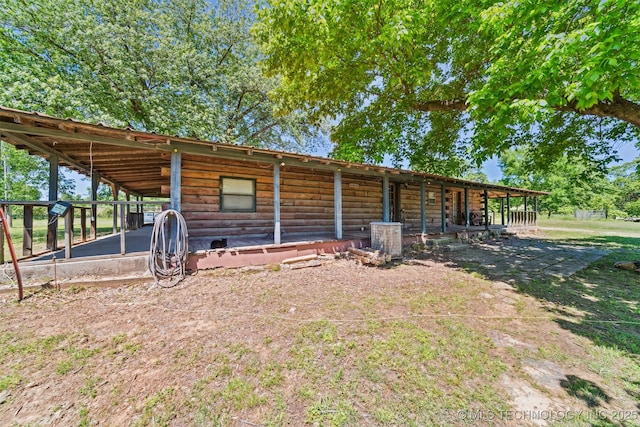 21170 S 270th Rd, Morris, OK 74445 - exterior space with an exterior structure, an outdoor structure, and log siding