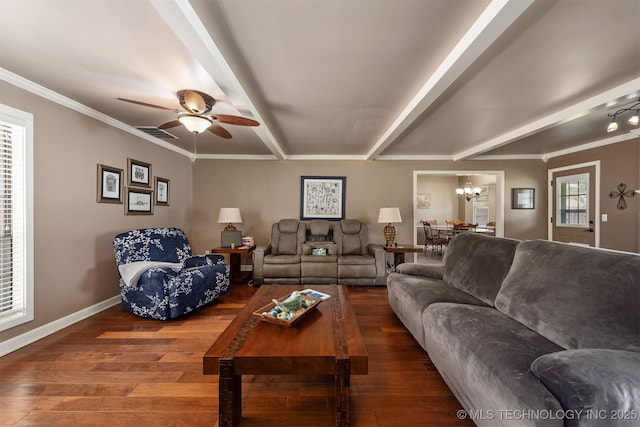 living area featuring a chandelier, wood finished floors, ornamental molding, baseboards, and a ceiling fan