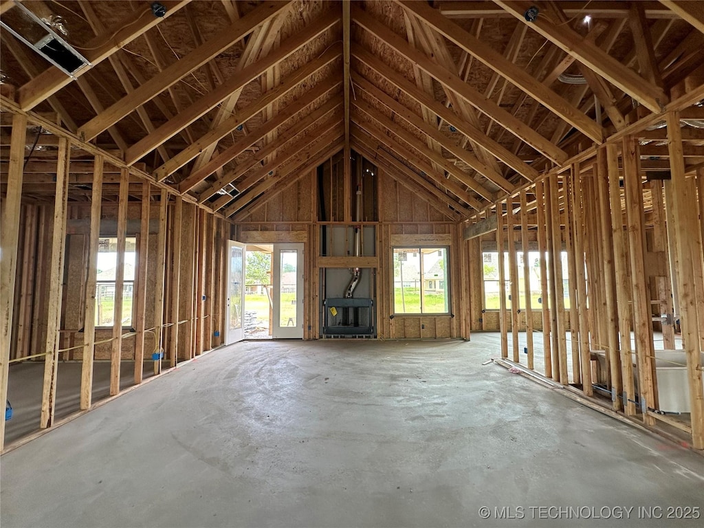 misc room with lofted ceiling