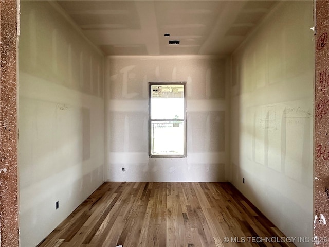 31005 E 67th St S, Broken Arrow, OK 74014 - empty room featuring wood finished floors