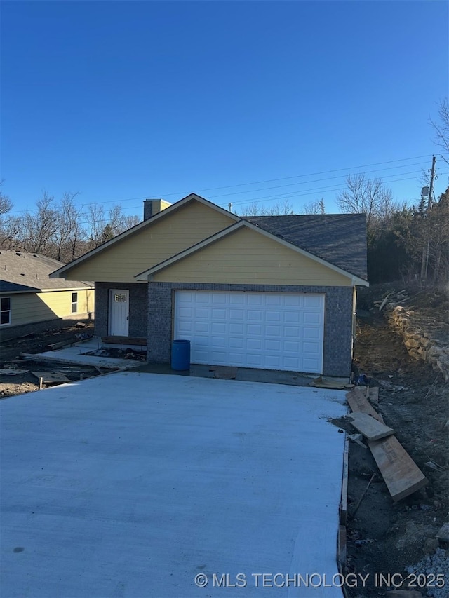 view of front of house featuring brick siding