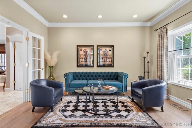10105 S 72nd E Ave, Tulsa, OK 74133 - living room featuring crown molding, light wood-style flooring, baseboards, and recessed lighting