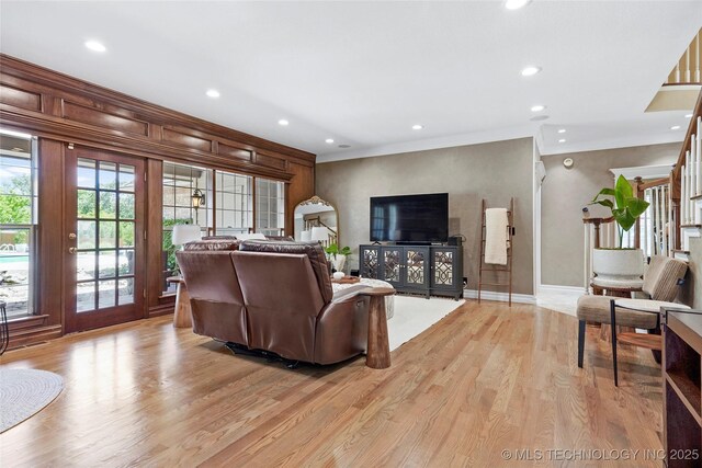 10105 S 72nd E Ave, Tulsa, OK 74133 - living room featuring recessed lighting, baseboards, light wood-style floors, ornamental molding, and stairway