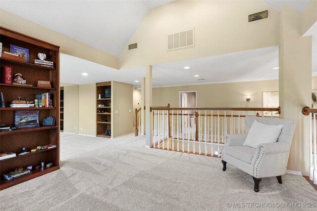 10105 S 72nd E Ave, Tulsa, OK 74133 - sitting room featuring carpet flooring, vaulted ceiling, recessed lighting, an upstairs landing, and baseboards