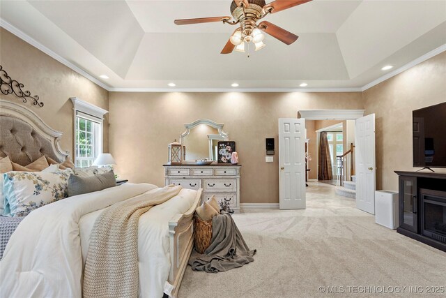 10105 S 72nd E Ave, Tulsa, OK 74133 - bedroom featuring a tray ceiling, lofted ceiling, light carpet, recessed lighting, and a ceiling fan
