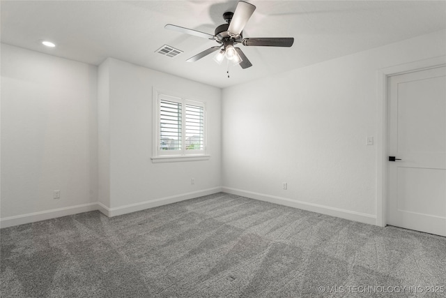 carpeted empty room with ceiling fan, baseboards, and recessed lighting