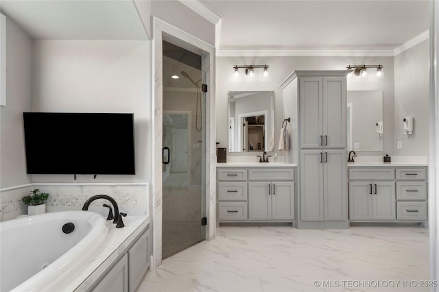 10616 N 81st E Pl, Owasso, OK 74055 - full bath featuring a stall shower, a bath, marble look tile flooring, ornamental molding, and two vanities