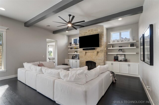 10616 N 81st E Pl, Owasso, OK 74055 - living area featuring beam ceiling, baseboards, a fireplace, ceiling fan, and dark wood finished floors