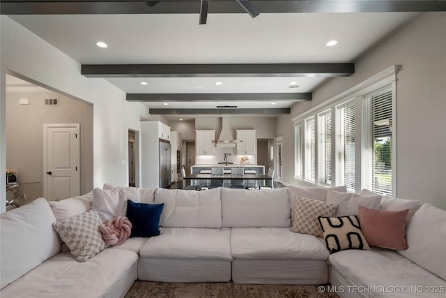 10616 N 81st E Pl, Owasso, OK 74055 - living area with beamed ceiling, recessed lighting, and a ceiling fan
