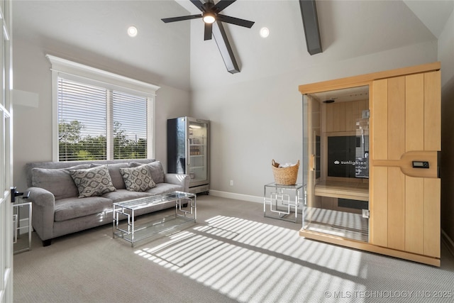 10616 N 81st E Pl, Owasso, OK 74055 - living room featuring light colored carpet, ceiling fan, baseboards, and high vaulted ceiling