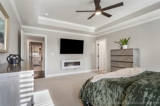 10616 N 81st E Pl, Owasso, OK 74055 - bedroom featuring a raised ceiling, baseboards, ornamental molding, and ceiling fan