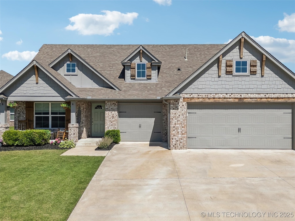 13309 S 19th Ct, Bixby, OK 74008 - craftsman house featuring concrete driveway, a front lawn, roof with shingles, brick siding, and an attached garage
