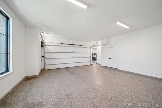 8499 S Timber Wolf Dr, Broken Arrow, OK 74014 - garage with baseboards