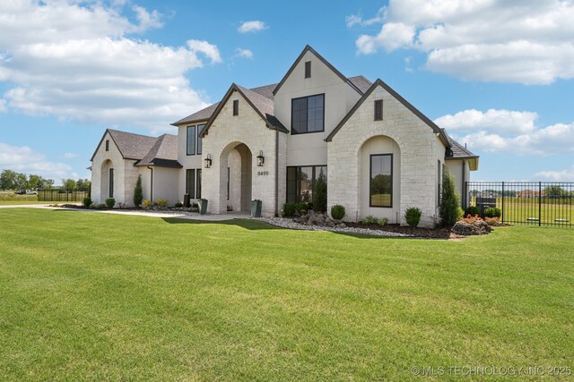 8499 S Timber Wolf Dr, Broken Arrow, OK 74014 - french country home with stone siding