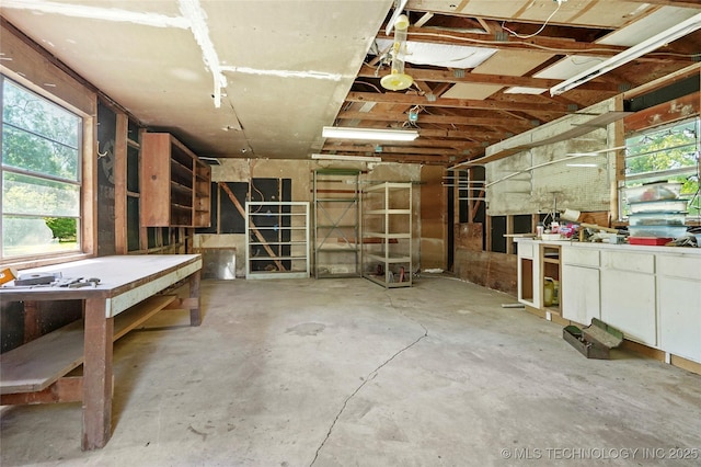 8508 E 123rd St S, Bixby, OK 74008 - misc room featuring concrete floors and a workshop area