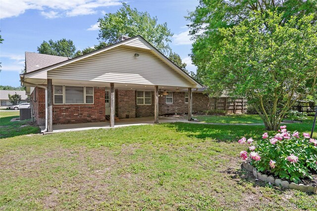 8508 E 123rd St S, Bixby, OK 74008 - rear view of property featuring a patio area and brick siding