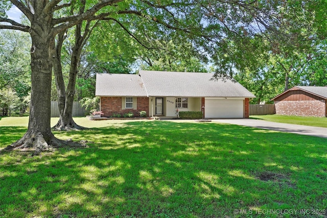 8508 E 123rd St S, Bixby, OK 74008 - view of front of home with a garage, concrete driveway, and brick siding