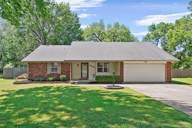 8508 E 123rd St S, Bixby, OK 74008 - view of front of house with an attached garage, concrete driveway, and brick siding
