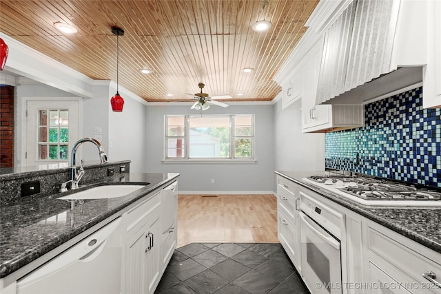 8508 E 123rd St S, Bixby, OK 74008 - kitchen with white appliances, ornamental molding, white cabinetry, a ceiling fan, and backsplash