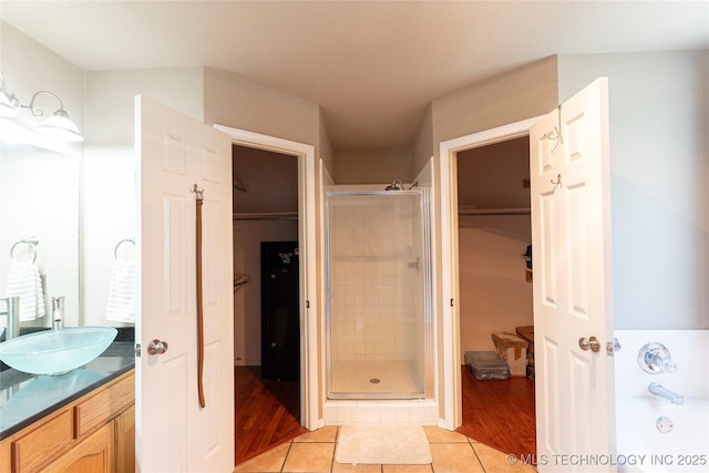11636 S 102nd E Ave, Bixby, OK 74008 - full bathroom featuring a stall shower, tile patterned flooring, a bath, and vanity