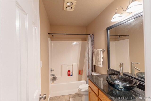 11636 S 102nd E Ave, Bixby, OK 74008 - bathroom with tile patterned floors, toilet, vanity, and shower / tub combo