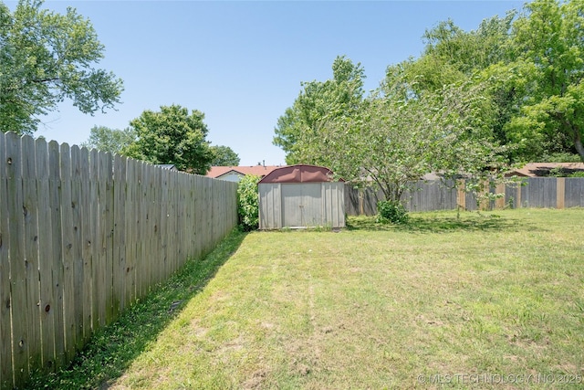 11636 S 102nd E Ave, Bixby, OK 74008 - view of yard featuring a storage unit and an outdoor structure