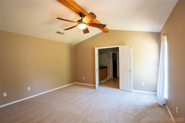 11636 S 102nd E Ave, Bixby, OK 74008 - unfurnished bedroom with light colored carpet, multiple windows, connected bathroom, and ceiling fan